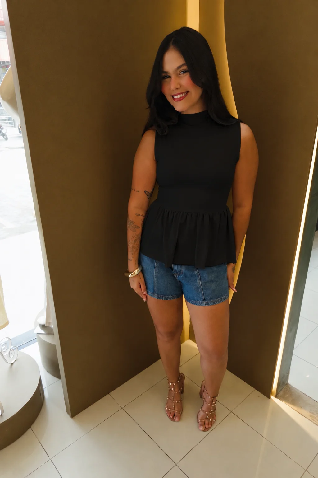 Blusa Peplum em Poliamida sem Manga Gola Alta